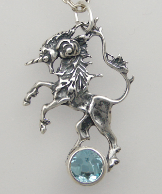 Sterling Silver Dancing Unicorn Pendant With Blue Topaz